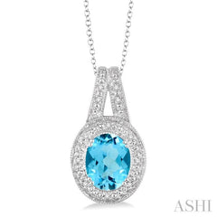 9x7 MM Oval Cut Blue Topaz a and 1/20 Ctw Round Cut Diamond Pendant in Sterling Silver with Chain