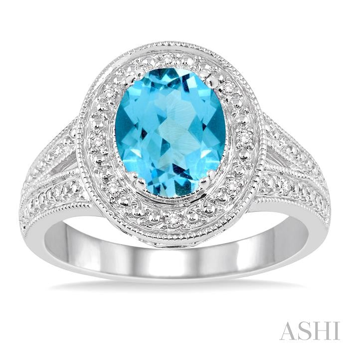 9x7 MM Oval Cut Blue Topaz a and 1/20 Ctw Round Cut Diamond Ring in Sterling Silver