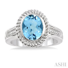 10x8 MM Oval Cut Blue Topaz and 1/20 Ctw Round Cut Diamond Ring in Sterling Silver