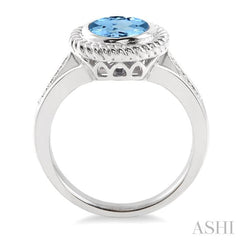 10x8 MM Oval Cut Blue Topaz and 1/20 Ctw Round Cut Diamond Ring in Sterling Silver