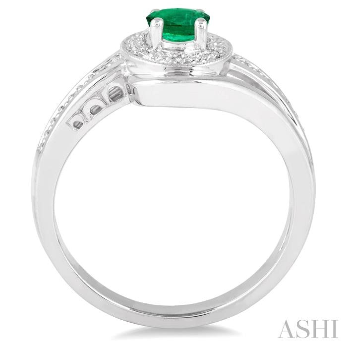 6x4 MM Oval Cut Emerald and 1/50 Ctw Round Cut Diamond Ring in Sterling Silver