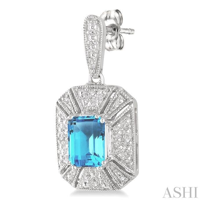 7x5 MM Emerald Shape Blue Topaz and 1/20 Ctw Round Cut Diamond Earrings in Sterling Silver