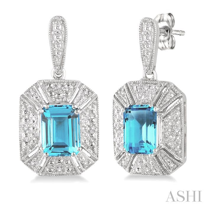 7x5 MM Emerald Shape Blue Topaz and 1/20 Ctw Round Cut Diamond Earrings in Sterling Silver